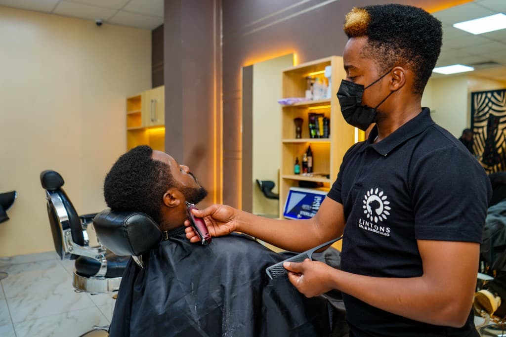 Lintons barber providing a precision beard trim