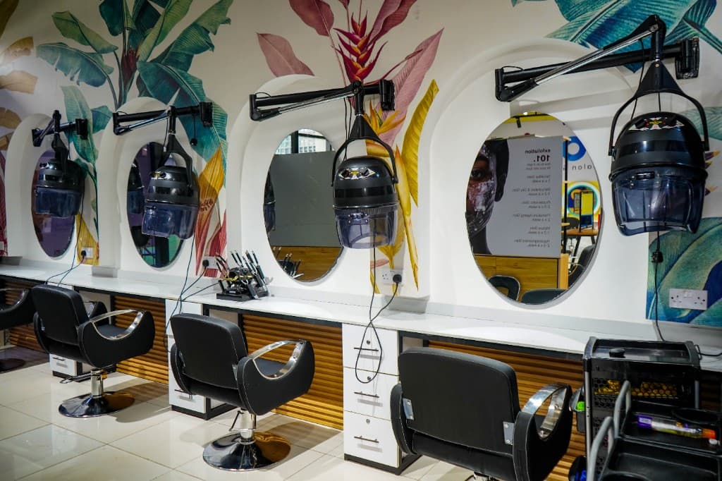 Lintons styling stations with tropical leaf decor